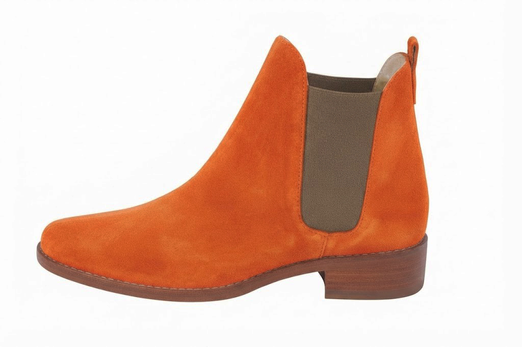 Elevate your look with solid-color leather Chelsea boots featuring sleek elastic side panels and effortless Parisian elegance, in orange and taupe leather with round toe and leather sole - Florence KOOIJMAN
